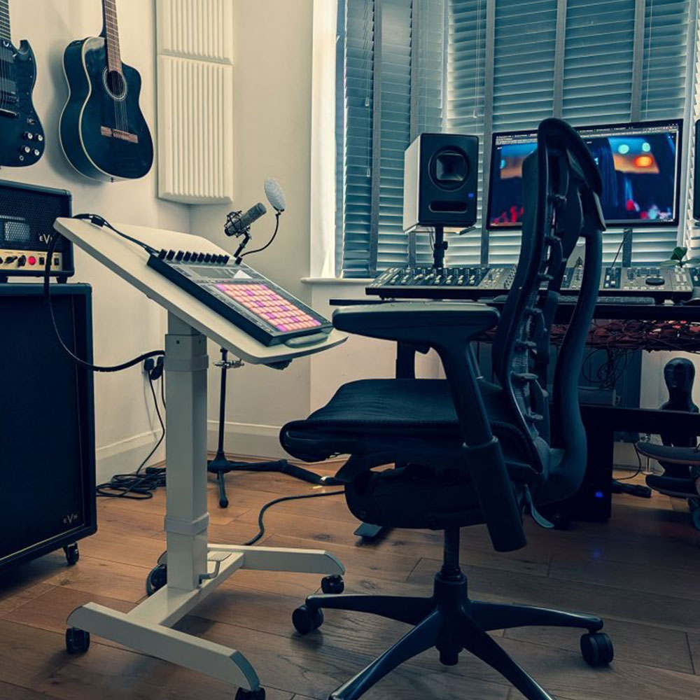 Wide detail of the SOWAYBEYOND studio, showing the desk, control surface and acoustic treatment
